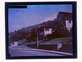 [View of houses along street]
