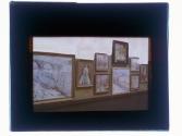 [Paintings on wall]