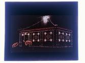[Building with Christmas decorations/lights]