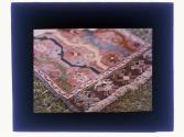 [Rug on grass]