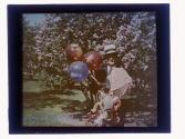 [Man with balloons]