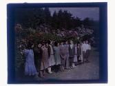 [Children in line in park]