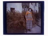 [Girl in front of house]