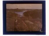 [Man viewing landscape and water]