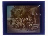 [Group portrait of men and boys, some with baseball mitts]