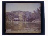 [Log cabin on landscape with water]