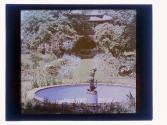 [View of house, garden and fountain]