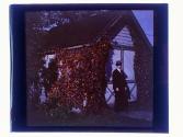 [Charles Zoller in front of garage]