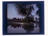 [House by body of water]