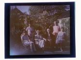 [Unid. group portrait in garden]