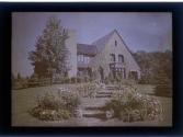 [House and garden]