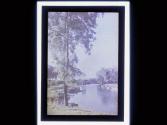 [Boat along river]