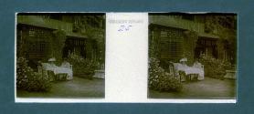 [Two women seated in cafe]