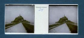 [View of town and castle on cliffs]