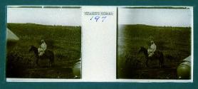 [Woman on horse in field]
