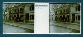 [Two women seated in cafe]