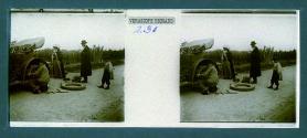 [Four people on side of road, man changing flat tire]