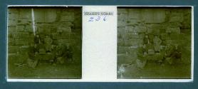 [Two women and two men picnicing on steps]