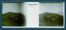 [Stone houses on hillside]