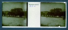 [Four men next to train]