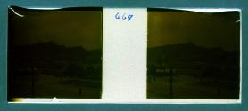 [View of people, dock and boats on water]