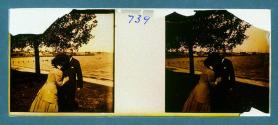 [Man and woman near water]