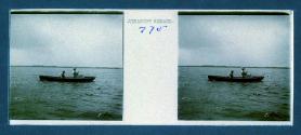 [Woman and man in rowboat, fishing]
