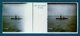 [Woman and man in rowboat, fishing]