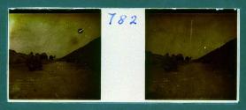 [Two men with camels]