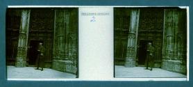[Unid. man standing in front of cathedral]