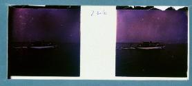 [Boat displaying American flag]