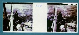 [Four people and dog on sailing ship]