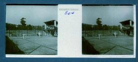 [Two men playing tennis]