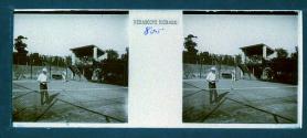 [Two men playing tennis]