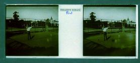 [Man playing tennis]