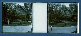 [Woman in front of house]
