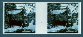 [Men on bench overlooking water]