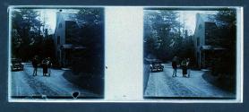 [Three people by house and car]