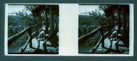 [Woman on bench overlooking water]