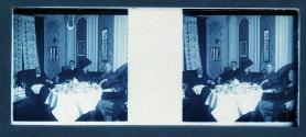 [People seated at table]