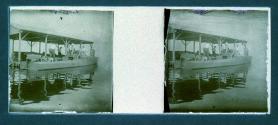 [People on dock working on boat]