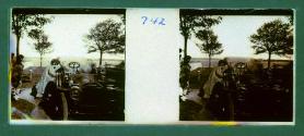 [Woman next to car]