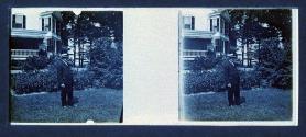 [Man outside house]