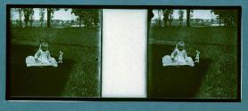 [Baby on blanket on grass]
