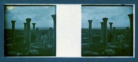 [Ruins - two men looking down well]