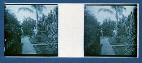 [Man and two women in garden]