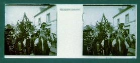 [Horseman, people and float on parade]