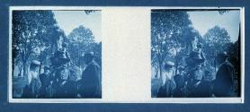 [Three women, one man in front of fountain]
