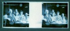 [Family at table]