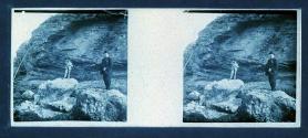 [Two men on rocks]